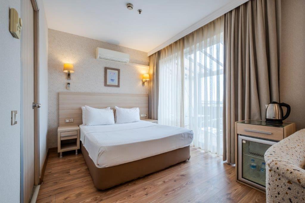 Отель Ramada By Wyndham Анкара Экстерьер фото